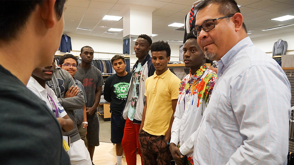 Jacinto Ramos listens to a group of students