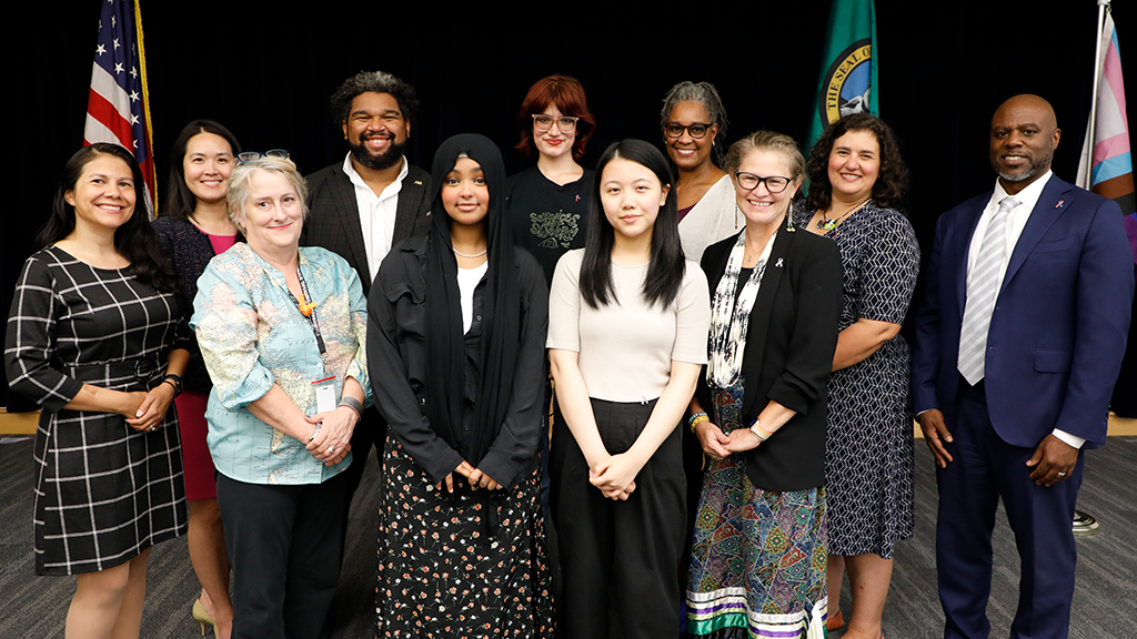 The School Board for Washington's Seattle Public Schools poses with the school district superintendent.